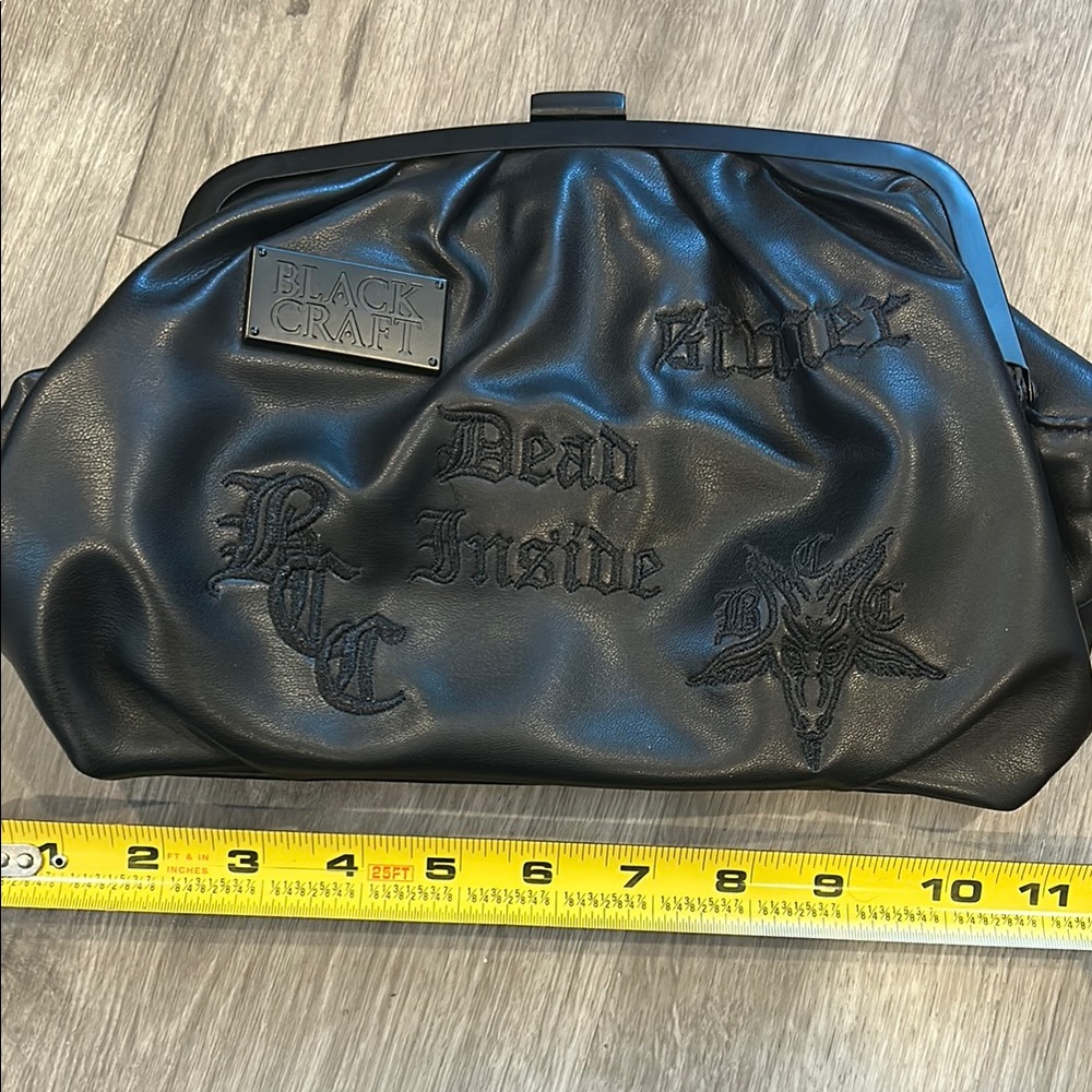 Blackcraft clutch bag